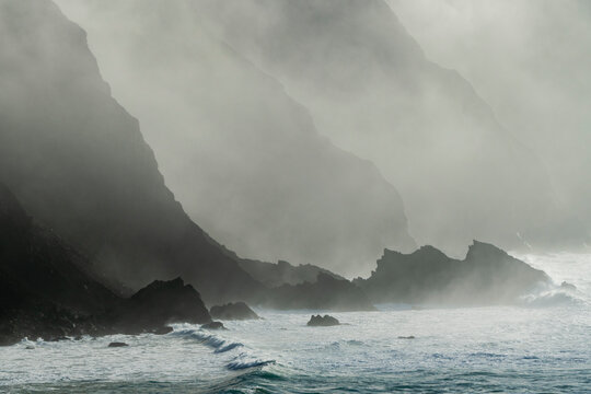 Scenic View of Sea Stacks sticking out of the fog at the Southern Oregon Coast