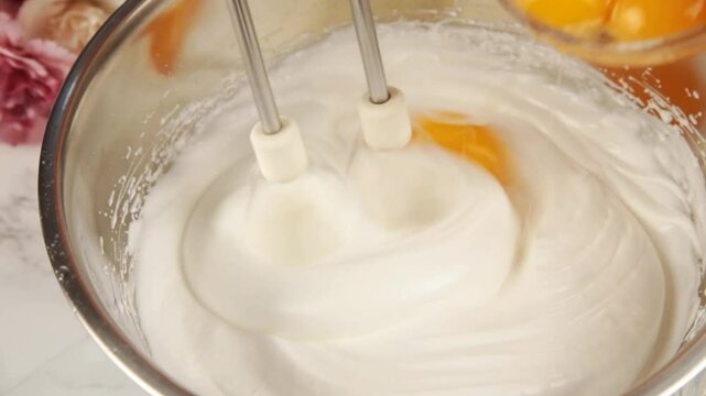 Whisking eggs for the cake