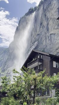 Incredible view of the Staubbach Falls in Lauterbrunnen, Switzerland. View on a sunny summer day.