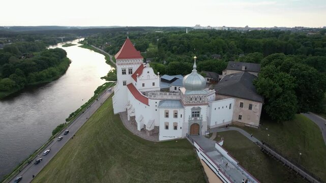 View of the Grodno Old Castle on the banks of the Neman River on a sunny day, Grodno, Belarus