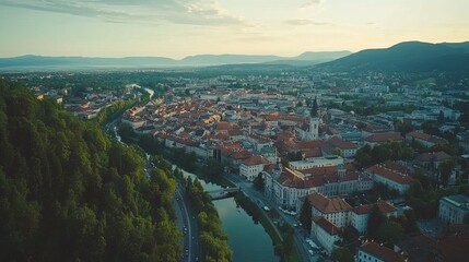 Serene River Cityscape: Sunset Aerial View of Charming European Town