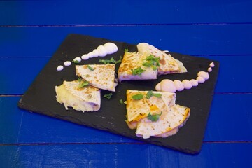 A plate of food with a blue background