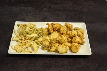 A plate of fried chicken and green beans