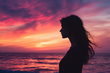 girl on the beach at sunset
