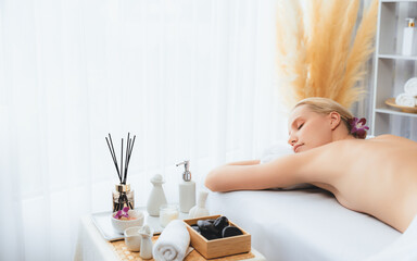 Caucasian woman customer enjoying relaxing anti-stress spa massage and pampering with beauty skin...