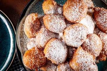 Small doughnuts with powdered sugar.