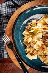 Pasta with sauerkraut and mushrooms.