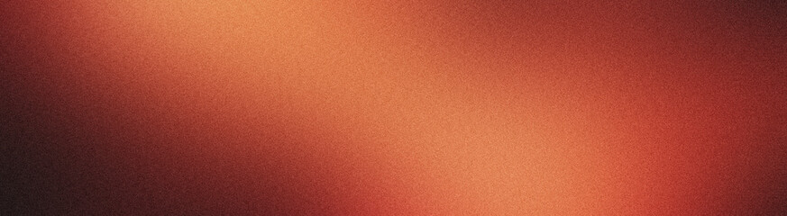 Fototapeta premium Warm orange and brown grainy gradient creating a textured background, perfect for designs and projects