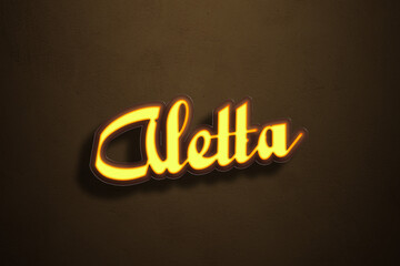 Obraz premium Yellow Neon Light Text Effect of name Aletta on Golden background.