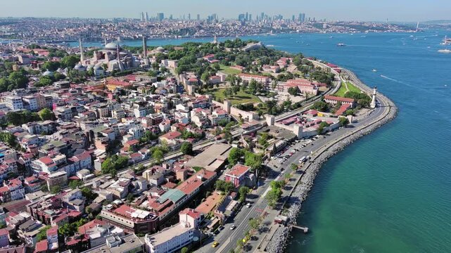 Istanbul, Turkey: Aerial view of largest Turkish city, famous historic landmark Hagia Sophia Grand Mosque, summer day with clear blue sky - landscape panorama of Europe / Asia from above
