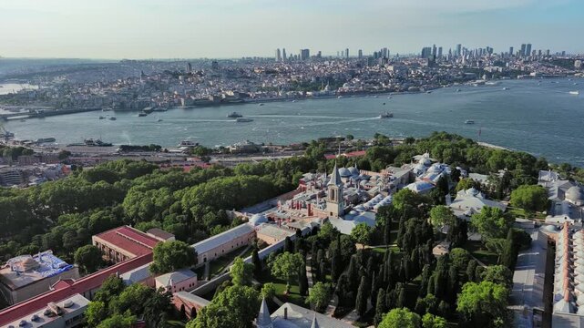 Istanbul, Turkey: Aerial view of largest Turkish city, famous historic landmark and museum Topkapi Palace (Topkapı Sarayı), sunny summer day - landscape panorama of Europe / Asia from above
