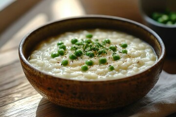 Creamy risotto with fresh peas, a simple and elegant dish, perfect for a light meal.