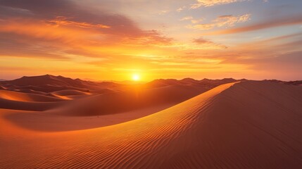 Sand dunes stand alone in a dry desert as the sun sets, casting a dramatic orange glow across the sky. The image evokes the idea of global warming and its impact on the environment.