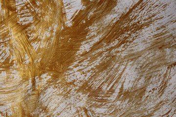 Art smear blot painting stucco dirty wall. Abstract texture beige, gold glitter color stain brush stroke relief grain texture background