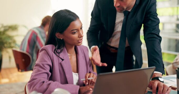 Design, laptop and management talking to employee in office for development, feedback or training. Conversation, creative and orientation with people at work for coaching or performance review