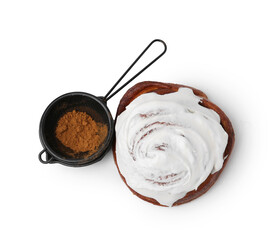 Tasty roll with cream and cinnamon isolated on white, top view