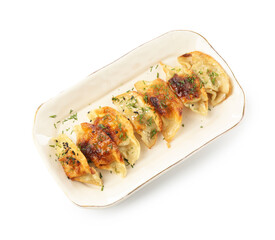 Tasty fried gyoza (dumplings) isolated on white, top view