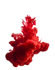 Red dye diluting in the water forming a cloud