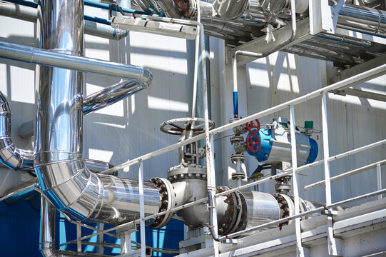 Pipelines and valves designed for industrial chemical processing in a modern chemical plant facility