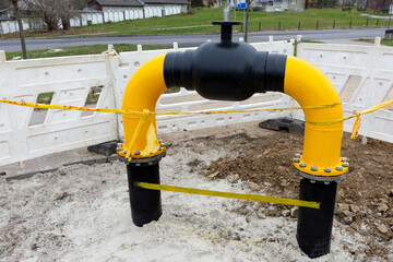 A new gas valve has been installed on a large pipe.