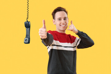 Cool young man showing 