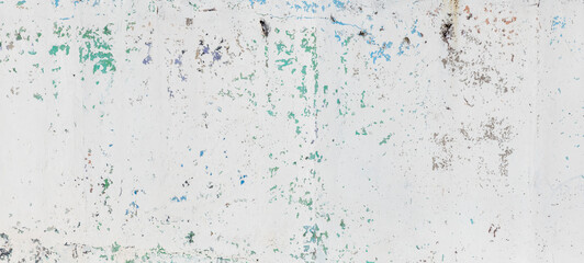 A close-up view of a weathered wall. Background texture