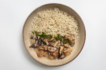 The image shows a bowl containing a savory dish. 