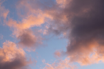 Pink and purple cloudscape painting the sky at sunset