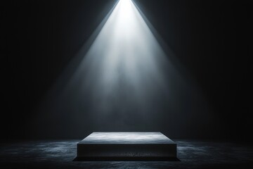 Obraz premium Spotlight illuminating empty stage in dark room, creating dramatic atmosphere