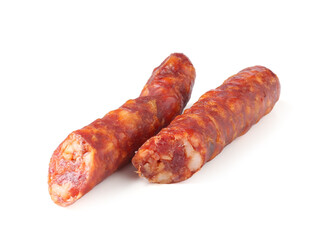 Pieces of delicious thin dry cured sausage isolated on white
