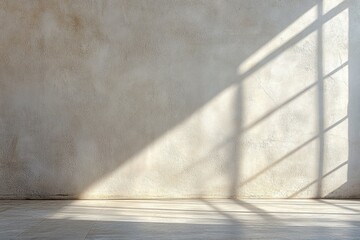 Sunlit room with textured wall and floor, creating a minimalist, serene ambiance.