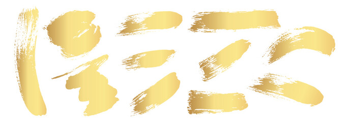 Obraz premium Gold Ink brush strokes. Golden Brush Stroke. Golden paint stains.Vector golden stain. Gold paint and ink brush strokes. Vector gold paint stroke set