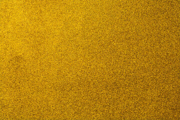 A gold background with a lot of small gold dots