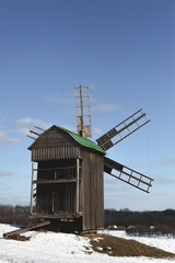 Old wooden windmill. Museum of Pies in Ukraine.
