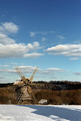 Old wooden windmill. Museum of Pies in Ukraine.