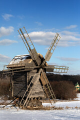 Old wooden windmill. Museum of Pies in Ukraine.
