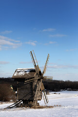 Old wooden windmill. Museum of Pies in Ukraine.