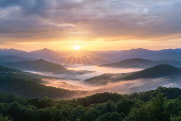 Obraz premium Sun rising over the great smoky mountains national park with fog covering the valley