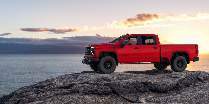 Red Chevrolet Silverado 2024 Model Parked on Scenic Hilltop at Sunset