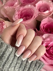 woman hands with pink rose