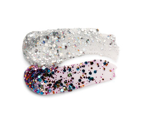 Glitter strokes on white background. Top view