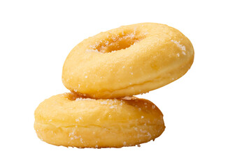Side view of brown sugar glazed cinnamon donuts in stack isolated with clipping path in png file format
