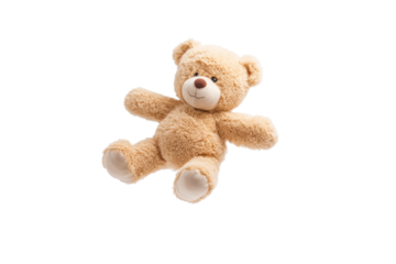 Teddy bear is laying on its back with its head turned to the side, isolated