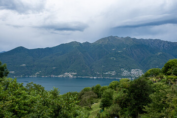 Fototapeta premium Scenic View over the Lago Maggiore in Italy with Ancona (Switzerland) and Mountains in the Background.