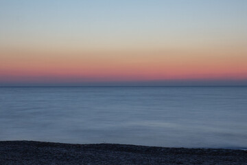 Naklejka premium Sea sunrise landdscape. Long exposure