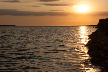 Sunset at sea. Sun and water nature