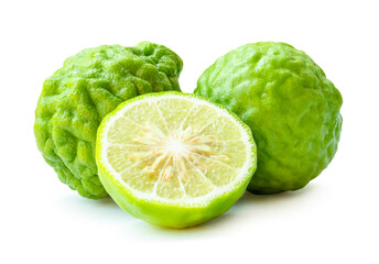 Side view of fresh green bergamot fruits or kaffir lime with half in stack isolated on white background with clipping path