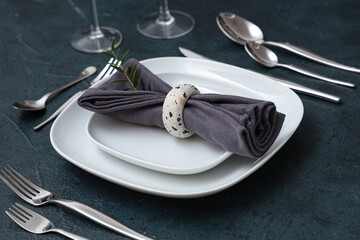 Set of clean tableware on black background. Closeup