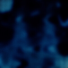 An abstract grainy texure gradient blur background image.