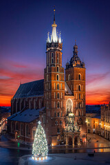 Main Square (Saint Mary's Basilica) in Krakow at magic dawn during Christmas time, Poland